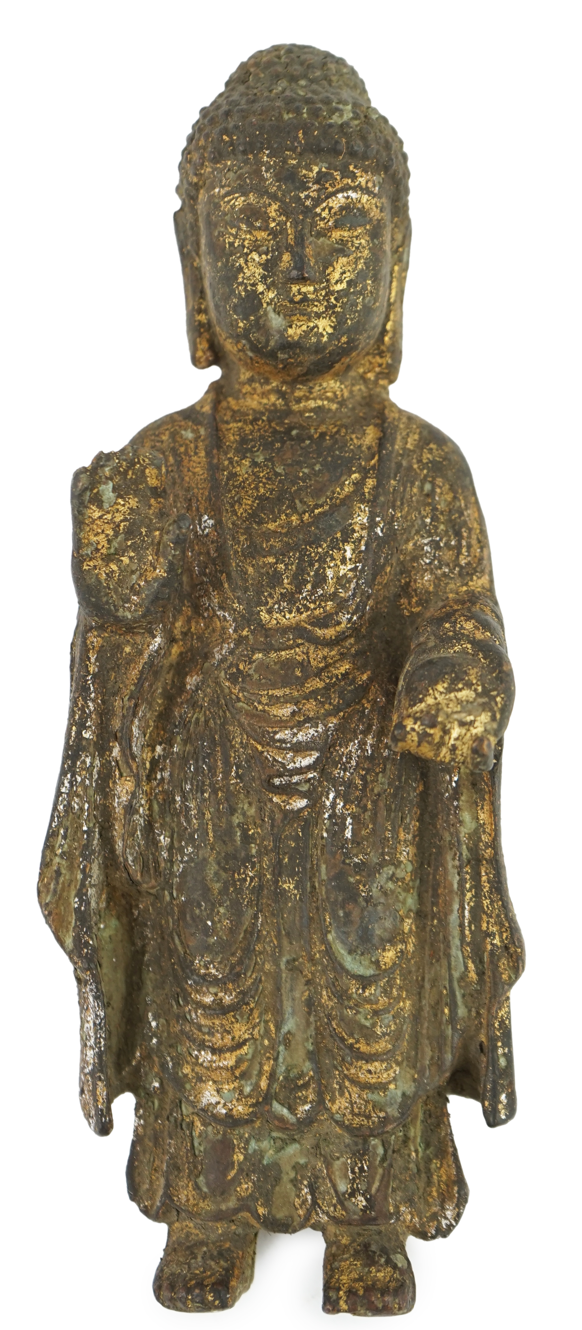 A Chinese gilt bronze model of a standing Buddha, 21.5cm. Condition - poor to fair